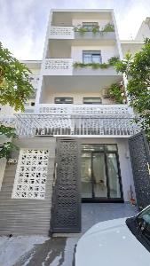 Nhà 4 tầng có thang máy mặt tiền đường Hương Sơn, 62,6m² ngang 5,4m, gara ô… – ảnh 1